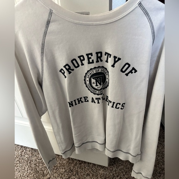 Nike Sweaters - Vintage Nike White Crewneck with Black “Property of Nike Athletics” Logo